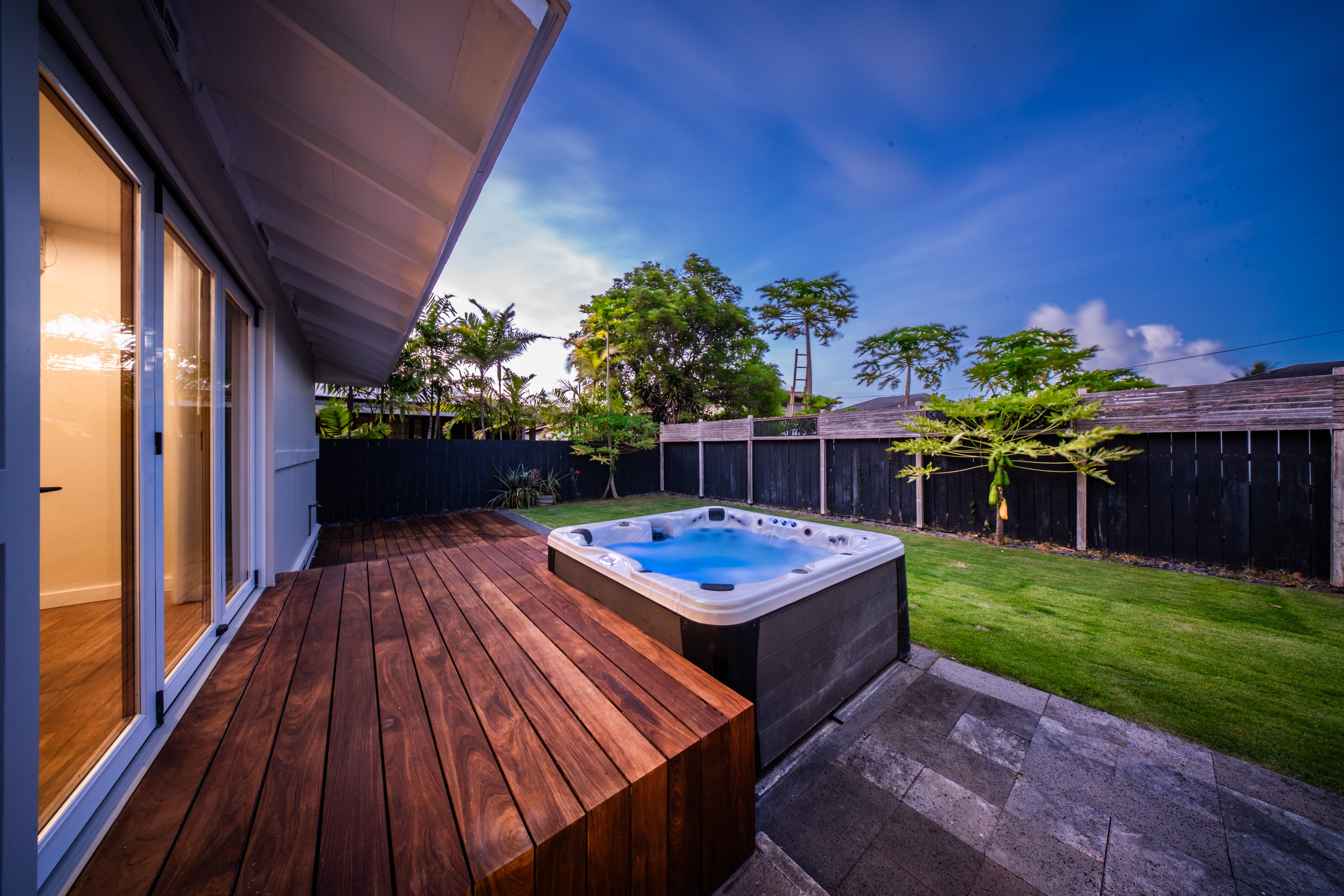 Backyard at night with ambient lighting